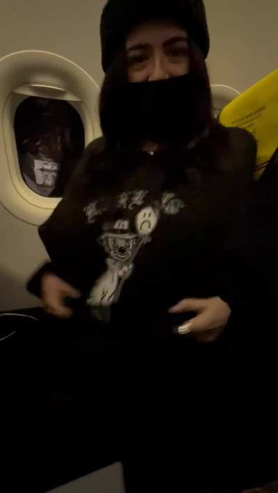 Risky airplane titty drop