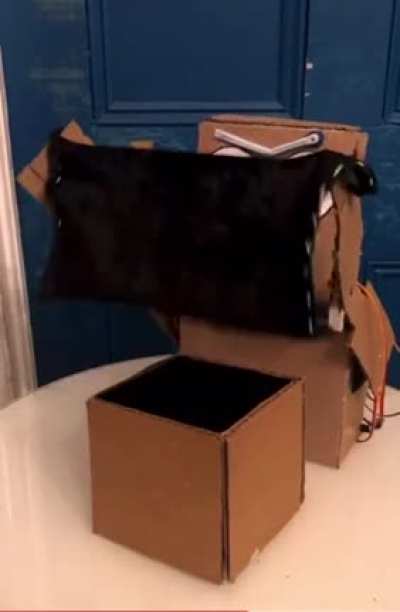 Robot programmed to do magic tricks
