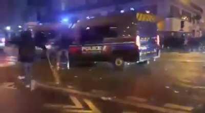 police crash during french protest.
