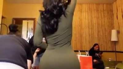 Clapping and bouncing ass in slow mo in dress