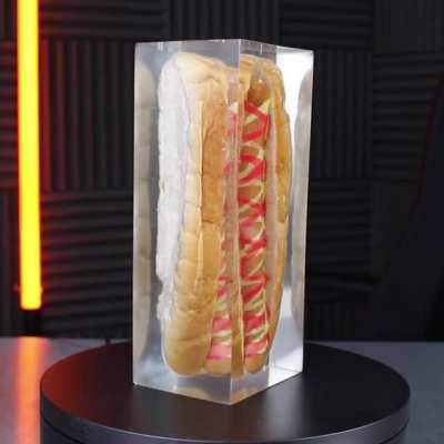 A hot dog in clear resin