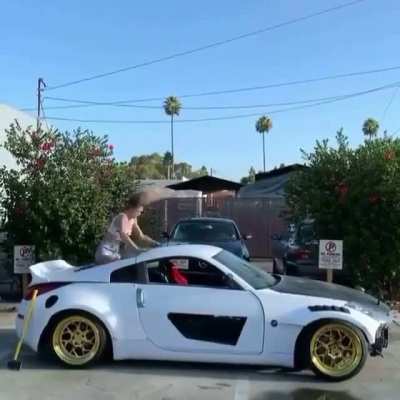 Girl shatters her boyfriend's car glass while trying to do a backflip