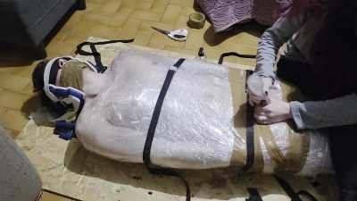 @00:23 Handjob with sextoy mummified in plastic foil post orgasm torment for 4 minutes long !