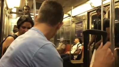 Man shouts verbal abuse at a child on the subway