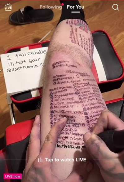 Some guy on live tattooing the @s of people who donate