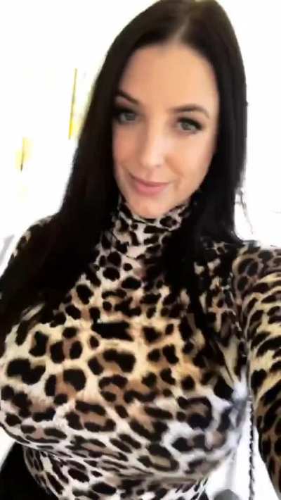 Bouncing breasts in a leopard sweater