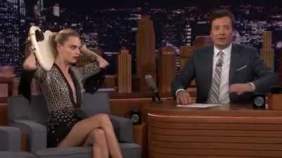 Cara Delevingne Plays Sweet Home Alabama On A Guitar Behind Her Head.