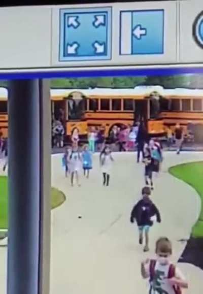 Kid gets run over in a crowd while running into school
