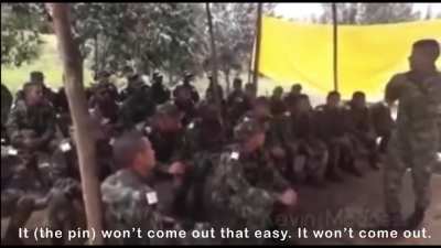 Instructor teaching a class how to use a grenade plays a prank.