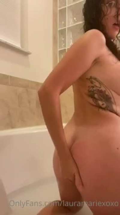 Laura playing with herself while taking a shower