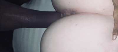 Splitting her fat white cheeks 