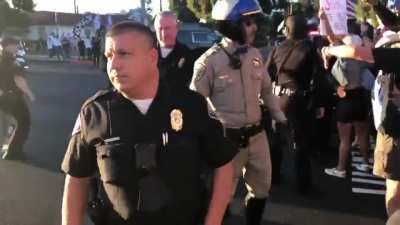 Crowd screams “fuck you” and “traitor” at the US president's motorcade during a visit to Long Beach, CA