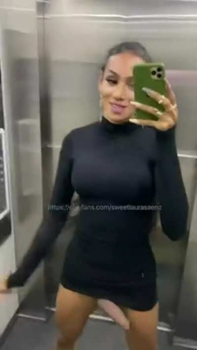 She shakes her huge cock in the elevator!