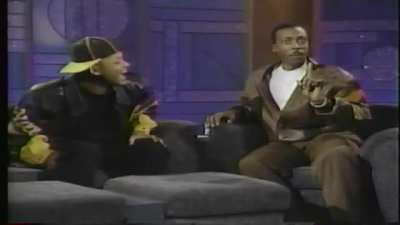 Will Smith making fun of Arsenio Hall's band member who had alopecia & telling the audience it's just a joke