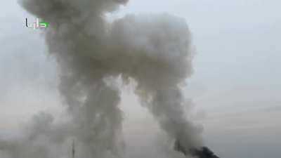 SAA helicopter drops a pair of bombs on Daraya - 2/23/2015