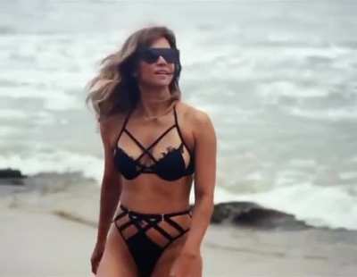 54 Year old Halle Berry strolling in a Bikini.