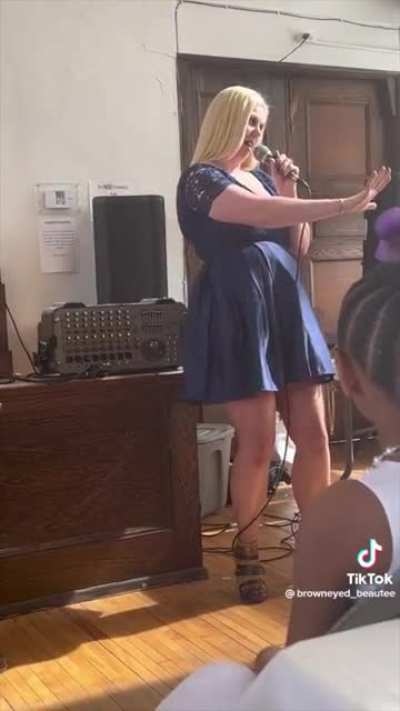 Bride's drunk friend gives wedding speech, assures everyone she's not racist