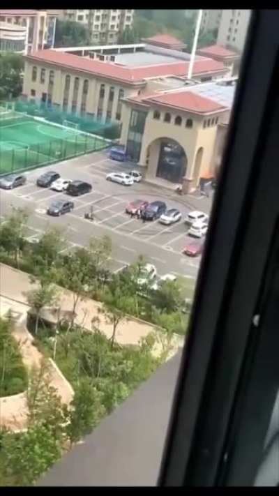 Guy had a meltdown and ran over his girlfriend multiple times in Tangshan, China