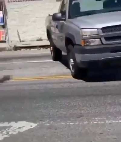 Driver evades spike strip like a pro.