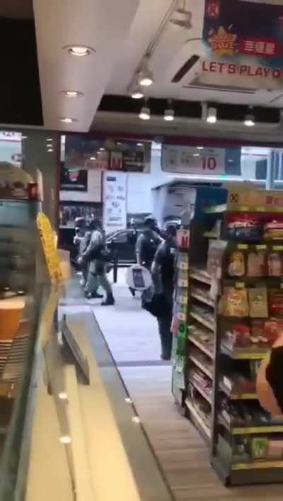 Hong Kong police think they're obligated to take drink for free