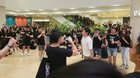Huge cheers from crowds inside a nearby mall, as democrat Roy Kwong passes through. He bows as protesters applaud him. From Hong Kong Free Press