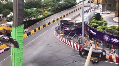 Slo-mo footage of this F3 driver surviving an insane crash at Macau GP circuit.