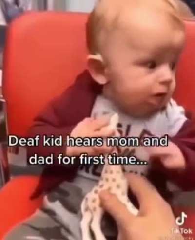 Deaf kid hears his parents for the first time