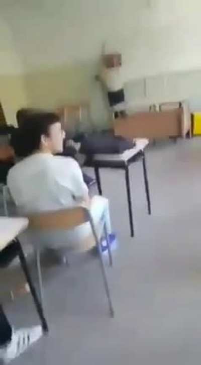 POS Throws trash can at professor