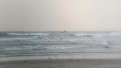 I was taking photos on the beach when I heard some singing