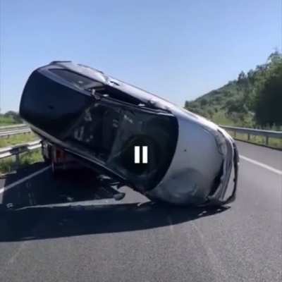 Man is clotheslined while trying to roll over a car with his tow truck