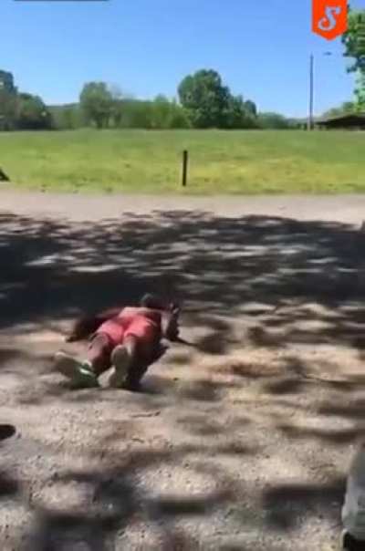 Guy throws a punch with God speed!
