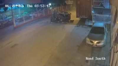 This video captures the moment that a panel van crashes into a freight container left roadside in Trinidad. It happened before 4a.m. The driver died at the scene. The passenger somehow survived.