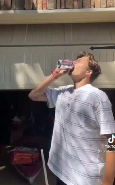 Chugging a sparkling water