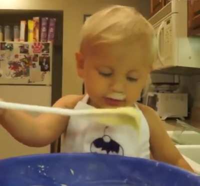 Toddler presenting his own baking show this is cutest thing i will see today.