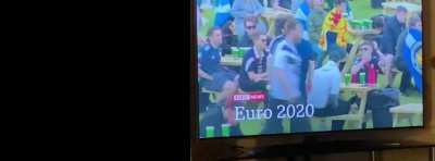 Scottish fan tries to kick bench