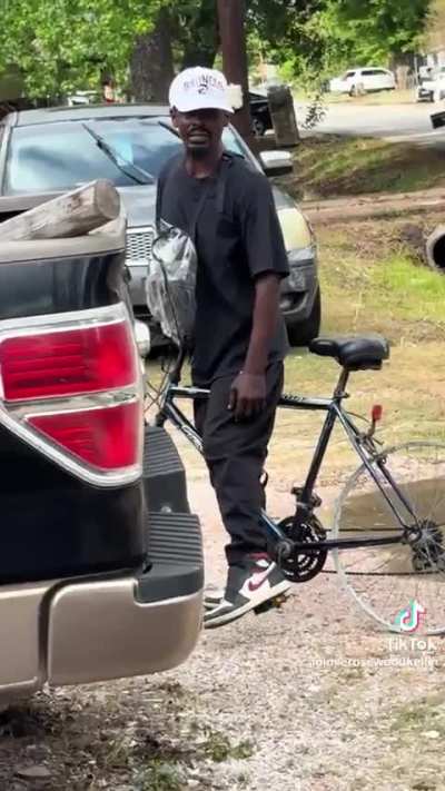 Bicycle. No tires. All rim. Scootin’ and bootin’ down the street