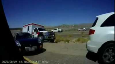 Ambulance driver has a few choice words for cars blocking his way