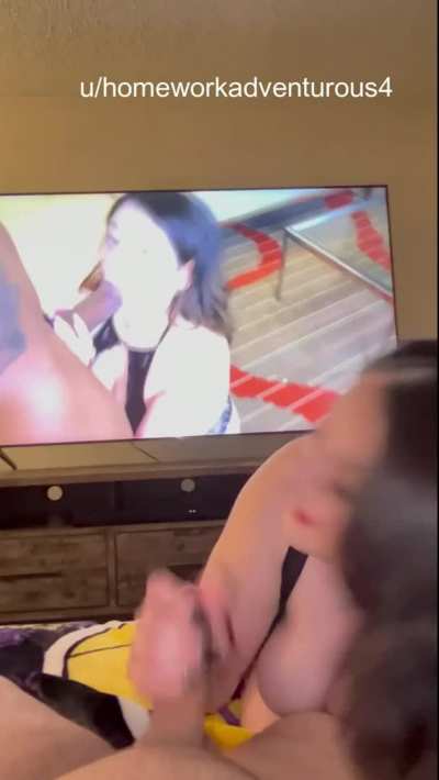 A nice take on this theme .... watching her play with a larger one on TV