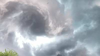 A rare view of a tornado forming while being underneath it!
