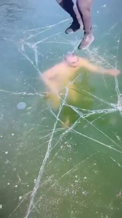 Idiot nearly dies in freezing cold lake