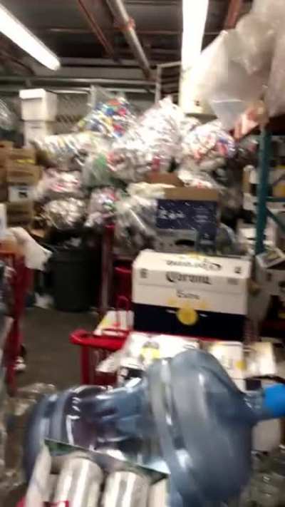 A grocery back store full of can and bottle after a holiday