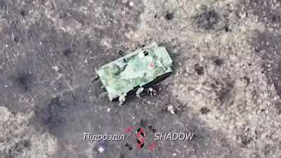 Ukrainian FPV drone takes out Russians hiding behind an out of action MT-LB. November 2023.
