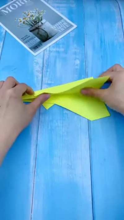 Paper plane and launcher.