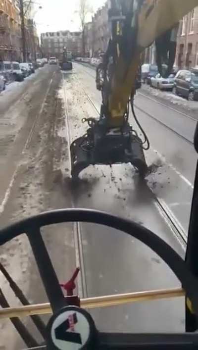 Tram rails being cleaned