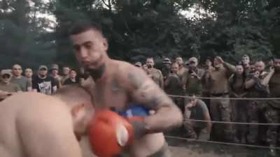 While Russian invaders get drunk, the Ukrainian soldiers engage themselves in some sport activities. Here's the first boxing tournament of AZOV Kyiv