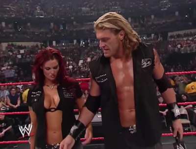 Lita with Edge & Mick Foley