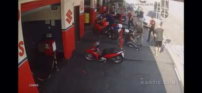 Two scooter riders become meat missiles and take out a third person.