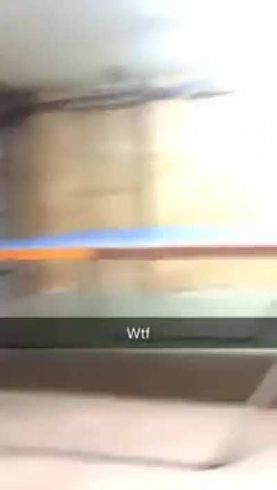 Kid throws ping pong paddle at his brother