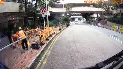 Man on fire is luckily saved by his incredibly helpful coworker.