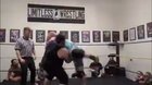 Wrestling move shocks a member of the crowd